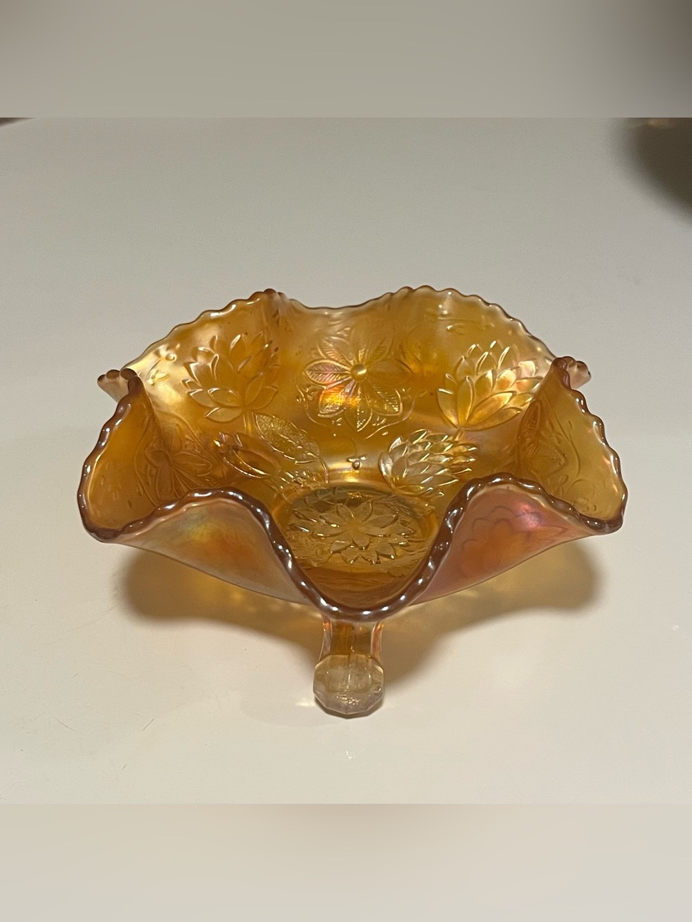 Marigold Carnival glass footed bowl